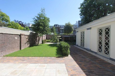 vernieuwde tuin en tuinmuren